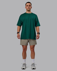 Man wearing Rep 5" Performance Shorts - Elephant | Thumbnail Index: 4