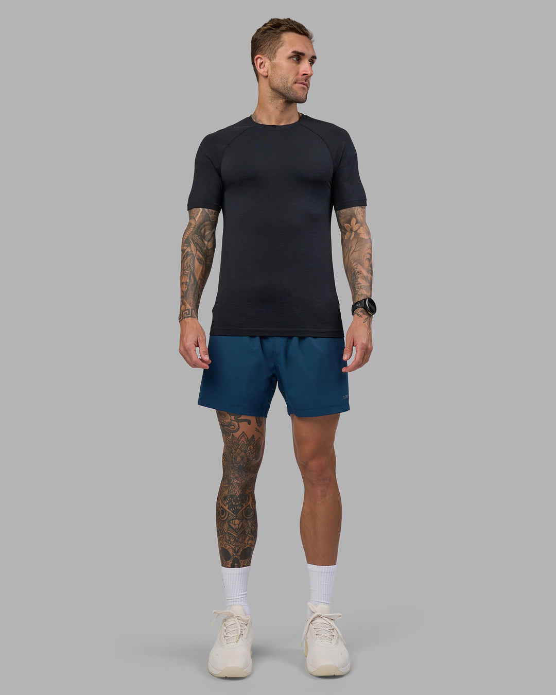 Man wearing Rep 5" Performance Short - Night Sea | Model:Tommy | Size:S - view 11