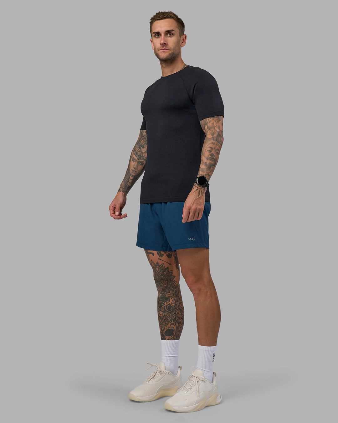 Man wearing Rep 5" Performance Short - Night Sea | Model:Tommy | Size:S - view 3