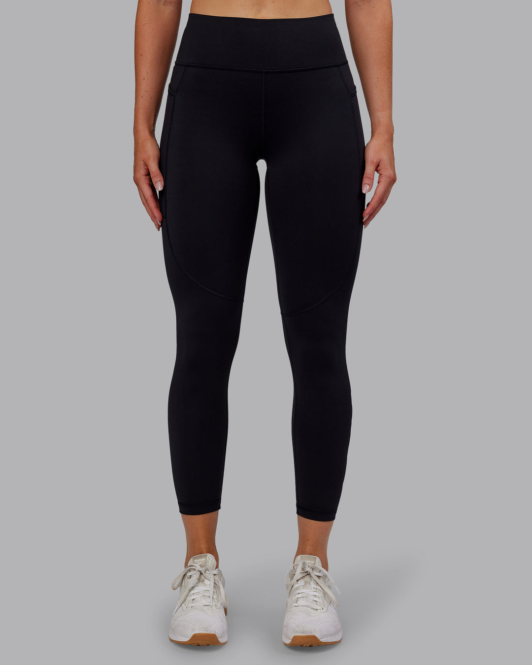 Woman wearing Rep Ultra High-Rise 7/8 Legging Pockets - Black-Retro Blue | Model:Paris | Size:S - view 8
