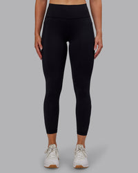 Woman wearing Rep Ultra High-Rise 7/8 Legging Pockets - Black-Retro Blue | Model:Paris | Size:S | Thumbnail Index: 7