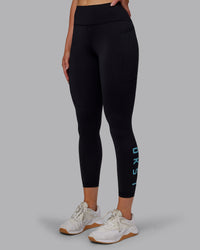 Woman wearing Rep Ultra High-Rise 7/8 Legging Pockets - Black-Retro Blue | Model:Paris | Size:S | Thumbnail Index: 8