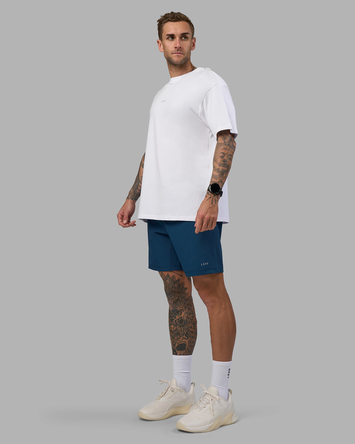 Man wearing Rep 7'' Performance Short - Night Sea | Model:Tommy | Size:S