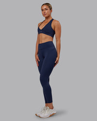 Woman wearing Rep Ultra High-Rise 7/8 Legging Pockets No Logo - Future Navy | Model:Paris | SIze:S | Thumbnail Index: 5