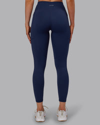 Woman wearing Rep Ultra High-Rise 7/8 Legging Pockets No Logo - Future Navy | Model:Paris | SIze:S | Thumbnail Index: 3