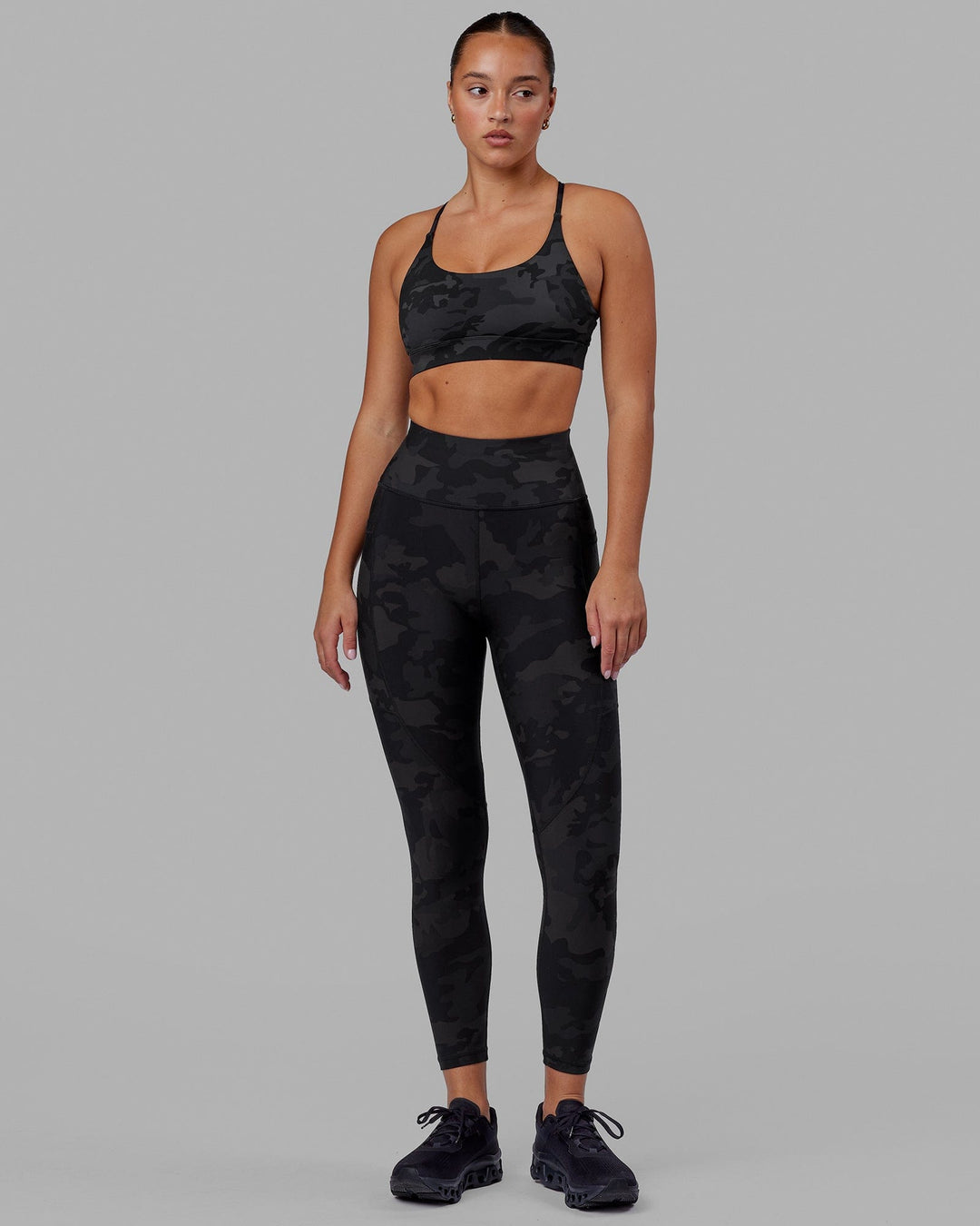 Woman wearing Rep Ultra High-Rise 7/8 Legging Pockets - Black Camo | Model:Milly | Size:S - view 3