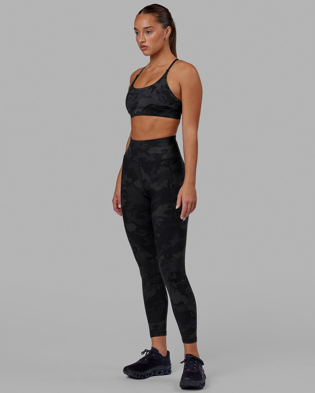 Woman wearing Rep Ultra High-Rise 7/8 Legging Pockets - Black Camo | Model:Milly | Size:S - view 9