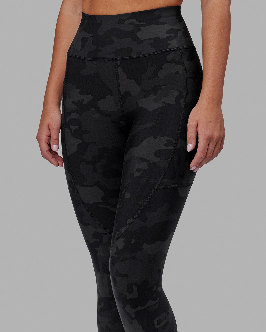 Woman wearing Rep Ultra High-Rise 7/8 Legging Pockets - Black Camo | Model:Milly | Size:S - view 7
