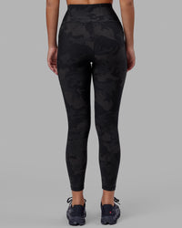 Woman wearing Rep Ultra High-Rise 7/8 Legging Pockets - Black Camo | Model:Milly | Size:S | Thumbnail Index: 3