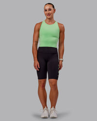 Woman wearing Rep Ultra High-Rise 9" Short Pockets - Black-Surreal Green | Model:Amber | Size:S | Thumbnail Index: 4