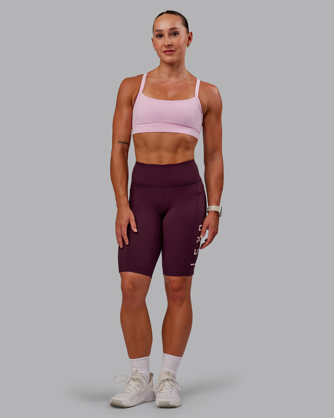 Woman wearing Rep Ultra High-Rise 9" Short Pockets - Cherry Lacquer-Marshmallow | Model:Amber | Size:S - view 6