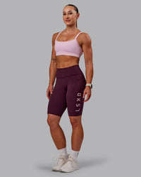 Woman wearing Rep Ultra High-Rise 9" Short Pockets - Cherry Lacquer-Marshmallow | Model:Amber | Size:S | Thumbnail Index: 2