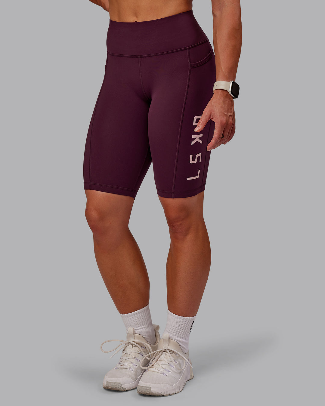 Woman wearing Rep Ultra High-Rise 9" Short Pockets - Cherry Lacquer-Marshmallow | Model:Amber | Size:S - view 4