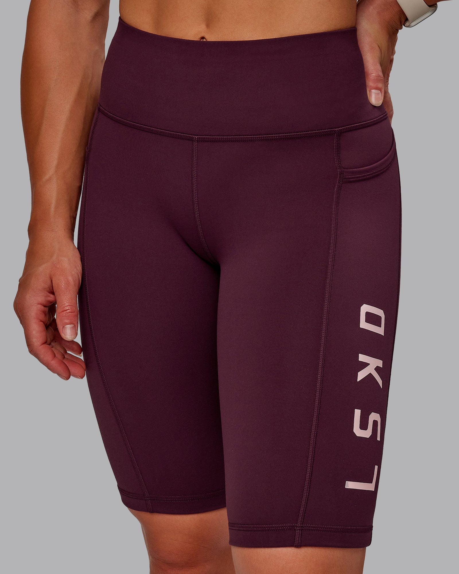 Woman wearing Rep Ultra High-Rise 9" Short Pockets - Cherry Lacquer-Marshmallow | Model:Amber | Size:S