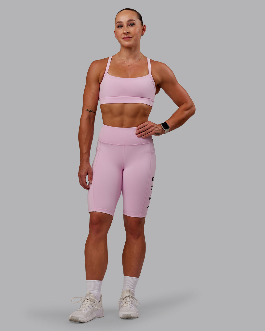 Woman wearing Rep Ultra High-Rise 9" Short Pockets - Marshmallow-Cherry Lacquer | Model:Amber | Size:S - view 3
