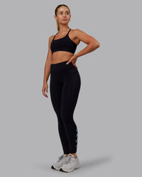 Woman wearing Rep Ultra High-Rise Full Length Legging Pockets - Black-Retro Blue | Model:Hannah | Size:S | Thumbnail Index: 4