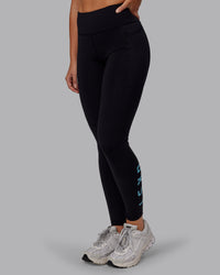 Woman wearing Rep Ultra High-Rise Full Length Legging Pockets - Black-Retro Blue | Model:Hannah | Size:S | Thumbnail Index: 5