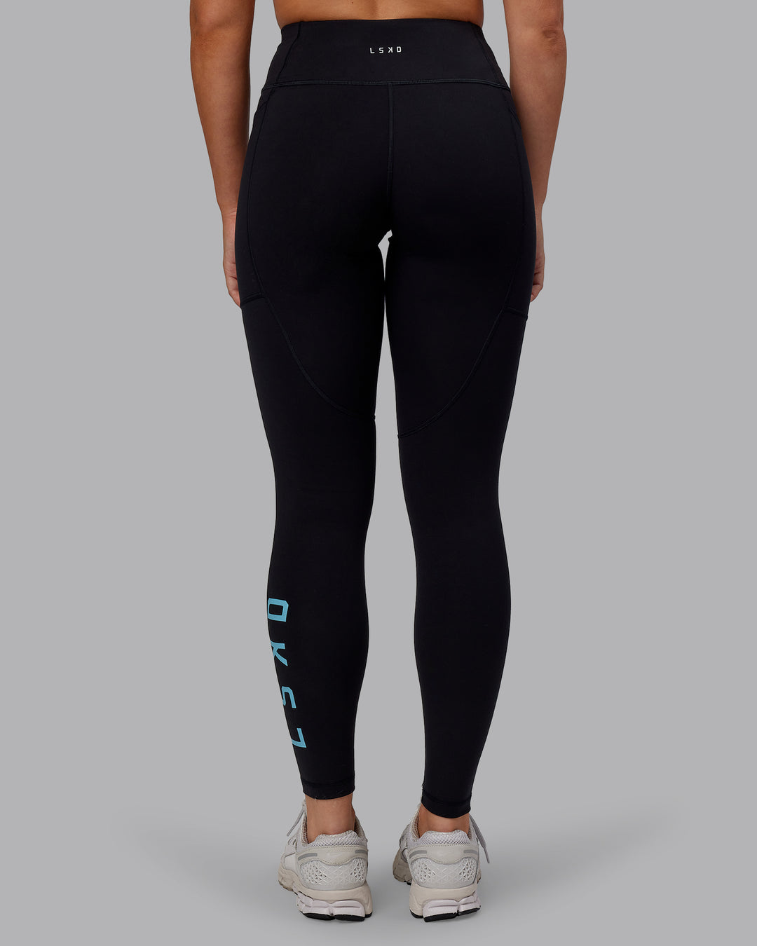 Woman wearing Rep Ultra High-Rise Full Length Legging Pockets - Black-Retro Blue | Model:Hannah | Size:S - view 4