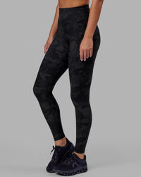 Woman wearing Rep Ultra High-Rise Full Length Legging Pockets - Black Camo | Model:Milly | Size:S | Thumbnail Index: 0