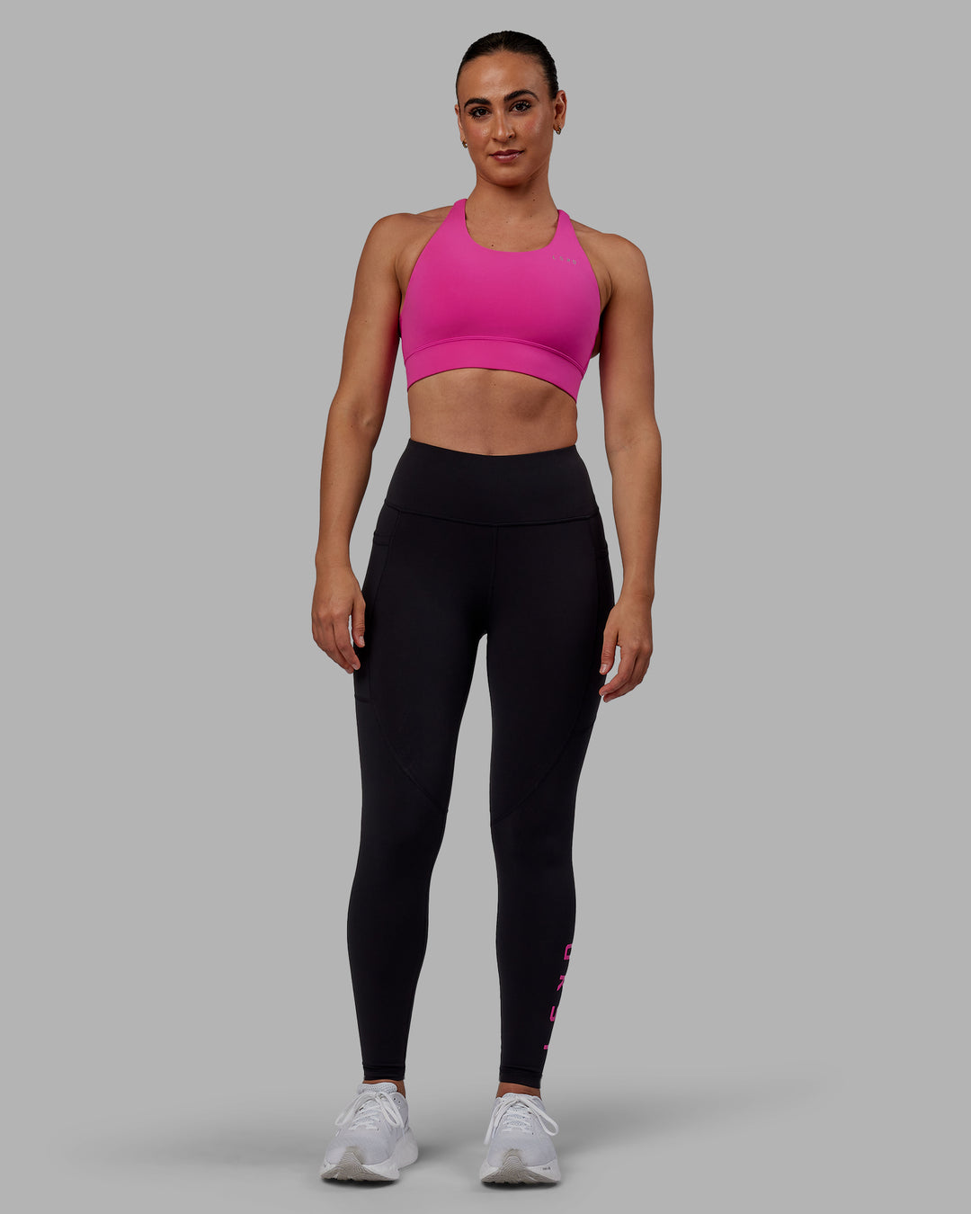 Woman wearing Rep Ultra High-Rise Full Length Legging Pockets - Black-Fuchsia Pink | Model:Sophie | Size:S - view 6
