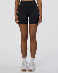 Woman wearing Rep Ultra High-Rise 6" Short Pockets - Black-Black | Model:Jordan | Size:S | Thumbnail Index: 7