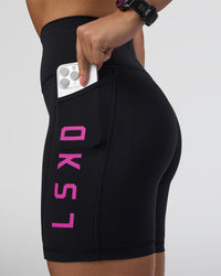 Woman wearing Rep Ultra High-Rise 6" Short Pockets - Black-Ultra Fuchsia | Model:Abbey | Size:S | Thumbnail Index: 5