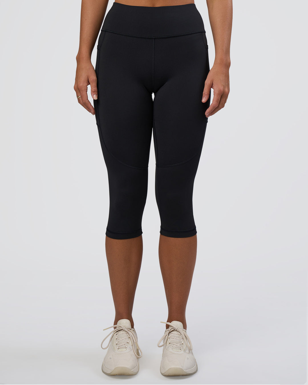 Woman wearing Rep Ultra High-Rise 3/4 Legging Pockets - Black-Black | Model:Amity | Size:S - view 9