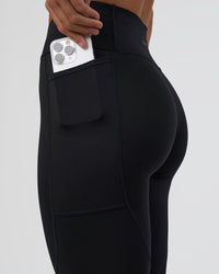 Woman wearing Rep Ultra High-Rise 3/4 Legging Pockets - Black-Black | Model:Amity | Size:S | Thumbnail Index: 2