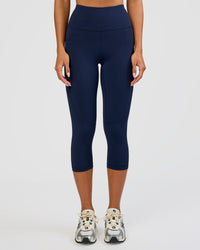 Woman wearing Rep Ultra High-Rise 3/4 Legging Pockets - Future Navy-White | Model:Dakota | Size:S | Thumbnail Index: 1