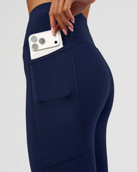 Woman wearing Rep Ultra High-Rise 3/4 Legging Pockets - Future Navy-White | Model:Dakota | Size:S | Thumbnail Index: 2