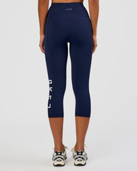 Woman wearing Rep Ultra High-Rise 3/4 Legging Pockets - Future Navy-White | Model:Dakota | Size:S | Thumbnail Index: 3