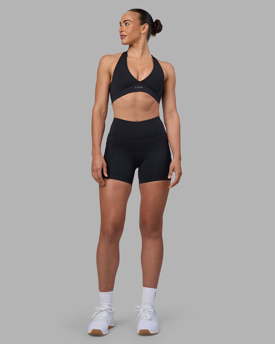 Woman wearing Rep Ultra High-Rise 4" Short Pockets - Black-Blue Atoll | Model:Sophie | Size:S - view 5