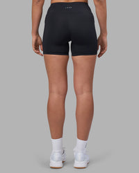 Woman wearing Rep Ultra High-Rise 4" Short Pockets - Black-Blue Atoll | Model:Sophie | Size:S | Thumbnail Index: 3