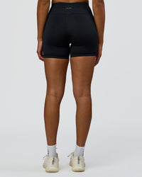 Woman wearing Rep Ultra High-Rise 4" Short Pockets - Black-Palace Blue | Model:Rosie | Size:S | Thumbnail Index: 4