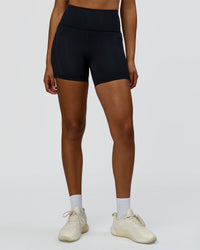 Woman wearing Rep Ultra High-Rise 4" Short Pockets - Black-Palace Blue | Model:Rosie | Size:S | Thumbnail Index: 8
