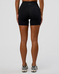 Woman wearing Rep Ultra High-Rise 4" Short Pockets - Black-Ultra Fuchsia | Model:Bianca | Size:S | Thumbnail Index: 3