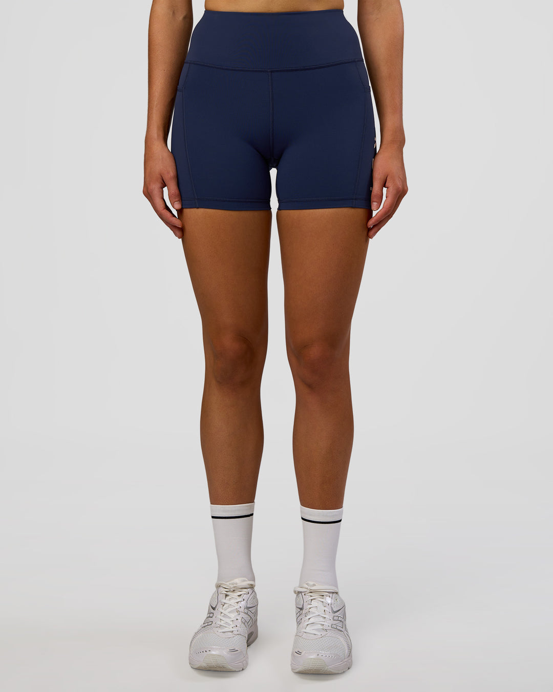 Woman wearing Rep Ultra High-Rise 4" Short Pockets - Future Navy-White | Model:Evie | Size:S - view 7