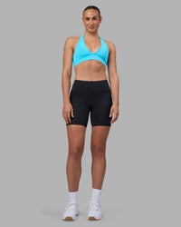 Woman wearing Rep Ultra High-Rise 6" Short Pockets - Black-Blue Atoll | Model:Sophie | Size:S | Thumbnail Index: 4