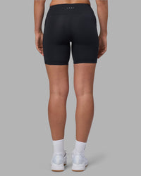 Woman wearing Rep Ultra High-Rise 6" Short Pockets - Black-Blue Atoll | Model:Sophie | Size:S | Thumbnail Index: 3
