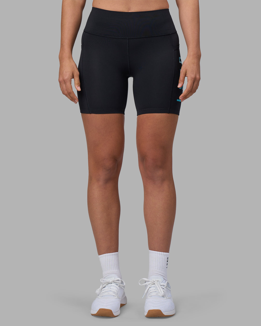 Woman wearing Rep Ultra High-Rise 6" Short Pockets - Black-Blue Atoll | Model:Sophie | Size:S - view 8
