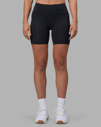 Woman wearing Rep Ultra High-Rise 6" Short Pockets - Black-Blue Atoll | Model:Sophie | Size:S | Thumbnail Index: 7