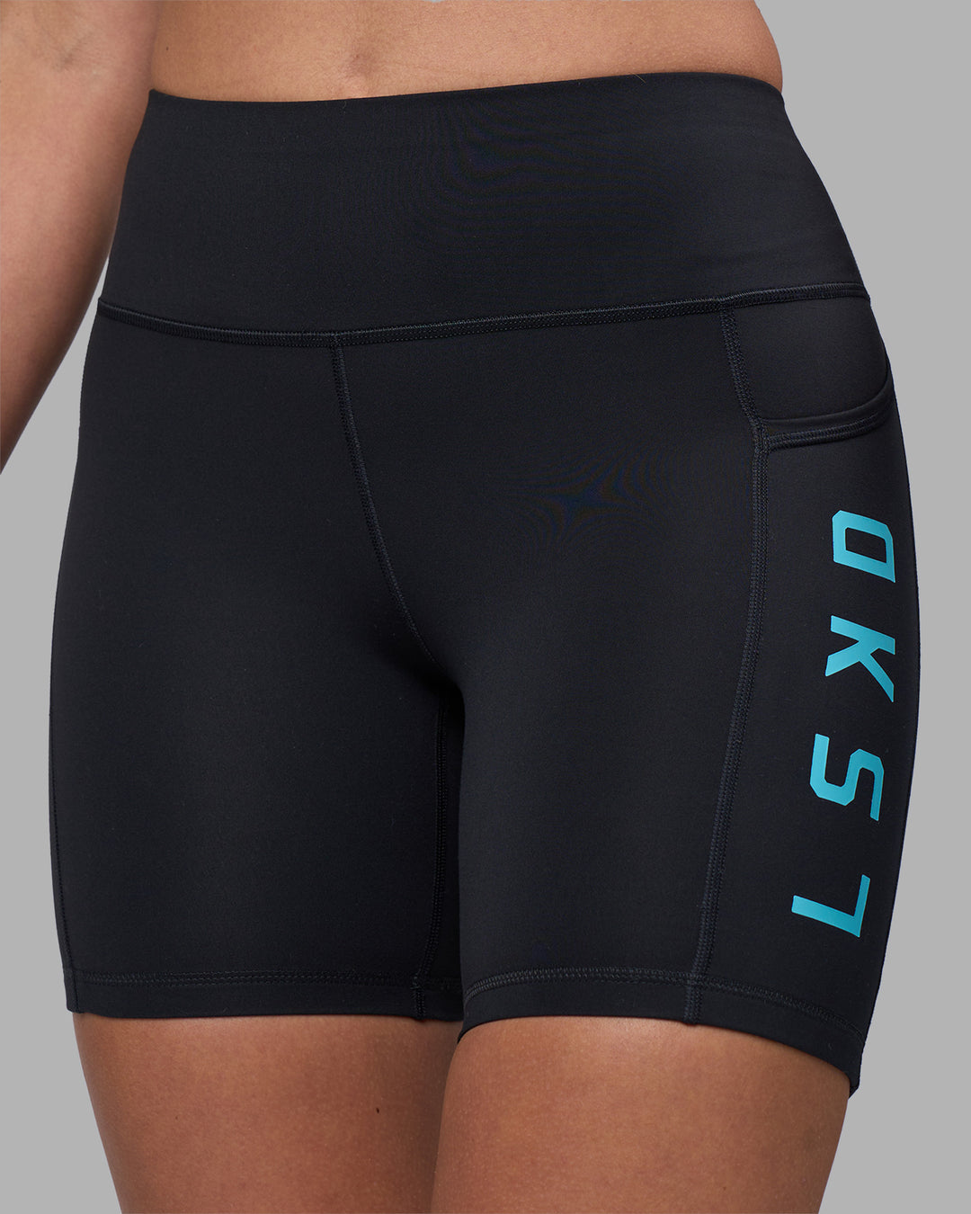 Woman wearing Rep Ultra High-Rise 6" Short Pockets - Black-Blue Atoll | Model:Sophie | Size:S - view 6