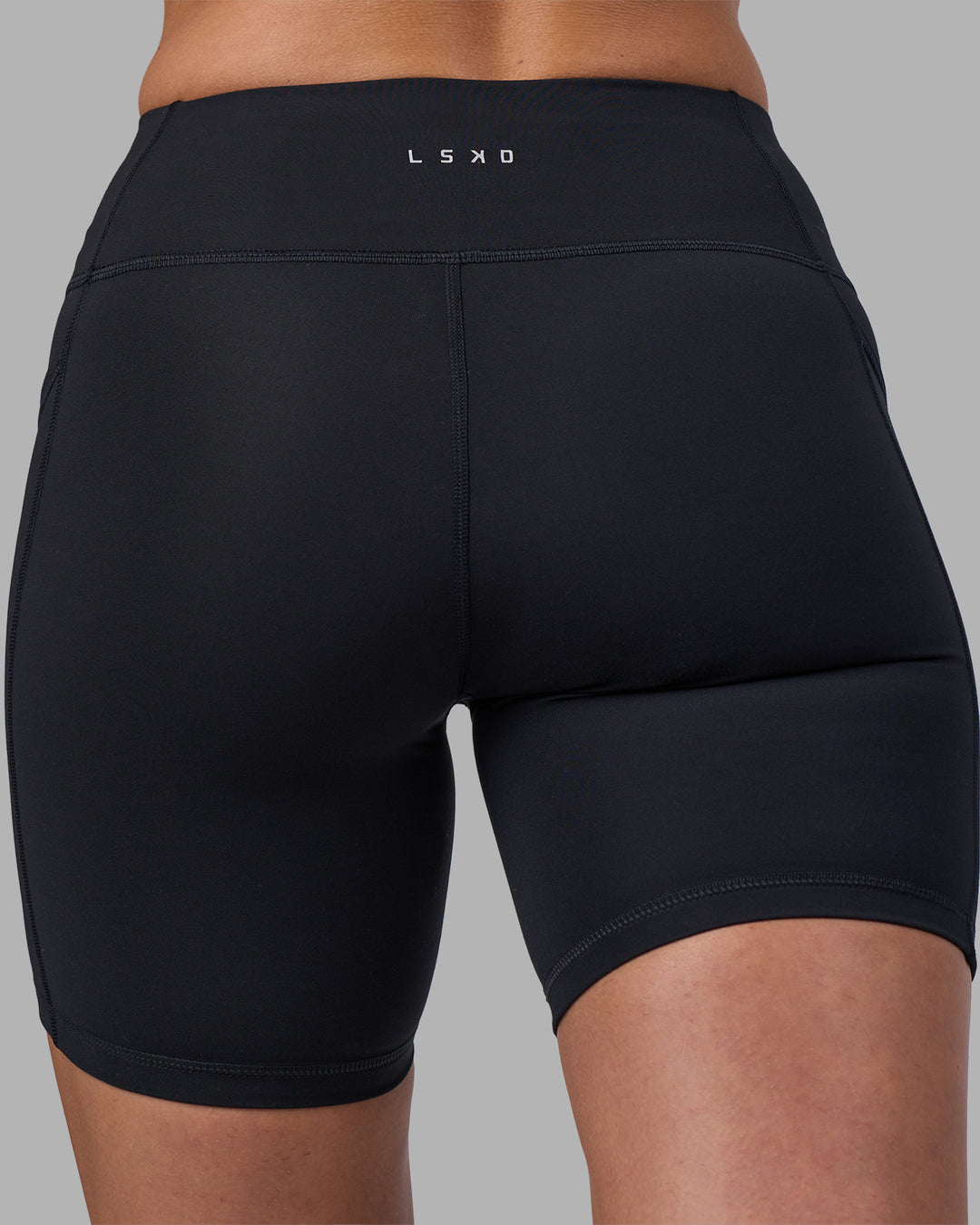 Woman wearing Rep Ultra High-Rise 6" Short Pockets - Black-Blue Atoll | Model:Sophie | Size:S - view 9