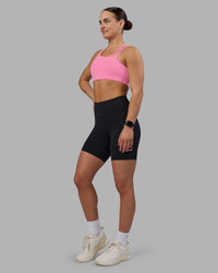 Woman wearing Rep Ultra High-Rise 6" Short Pockets - Black-Candy Pink | Model:Keisha | Size:S | Thumbnail Index: 4
