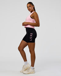 Woman wearing Rep Ultra High-Rise 6" Short Pockets - Black-Marshmallow | Model:Rosie | Size:S | Thumbnail Index: 5