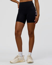 Woman wearing Rep Ultra High-Rise 6" Short Pockets - Black-Marshmallow | Model:Rosie | Size:S | Thumbnail Index: 6