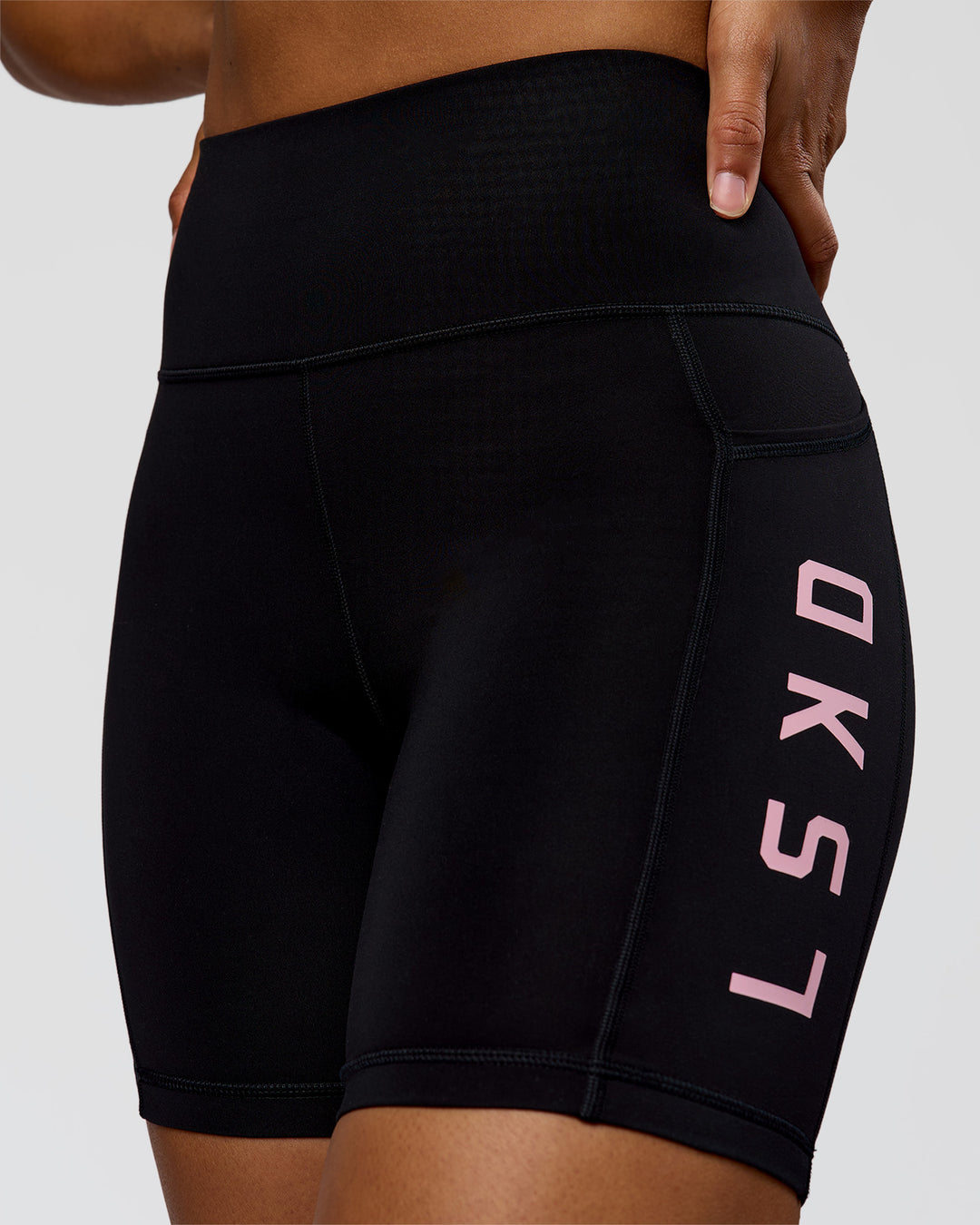 Woman wearing Rep Ultra High-Rise 6" Short Pockets - Black-Marshmallow | Model:Rosie | Size:S - view 5