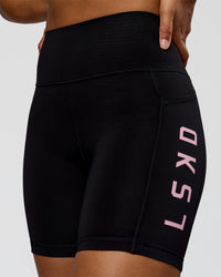 Woman wearing Rep Ultra High-Rise 6" Short Pockets - Black-Marshmallow | Model:Rosie | Size:S | Thumbnail Index: 4