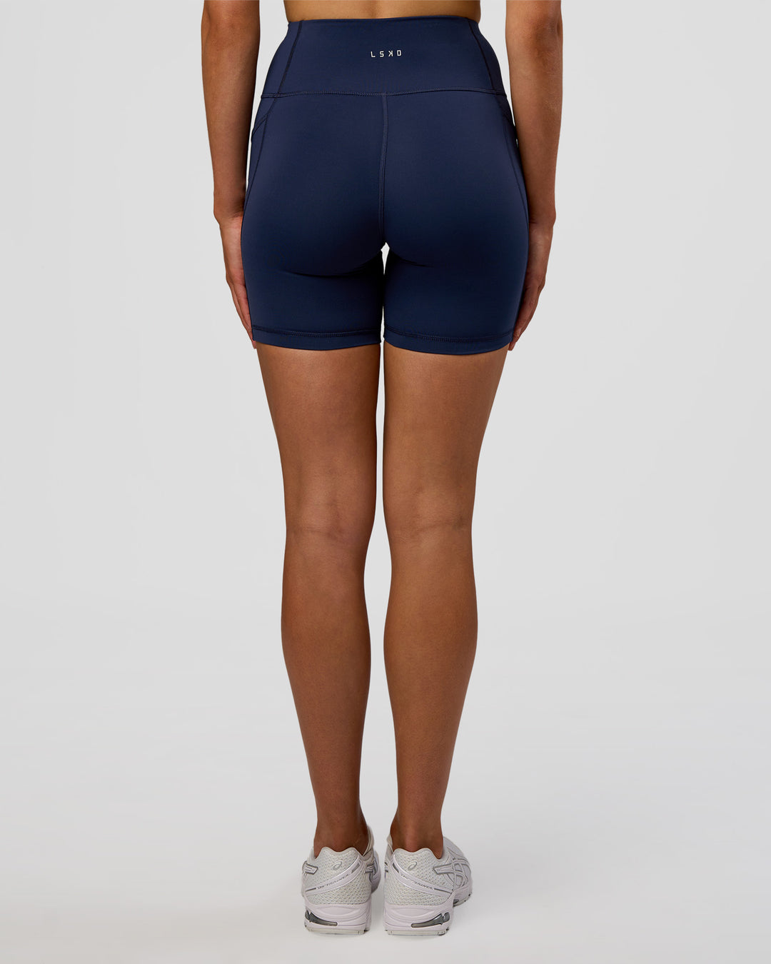 Woman wearing Rep Ultra High-Rise 6" Short Pockets - Future Navy-White | Model:Evie | Size:S - view 8