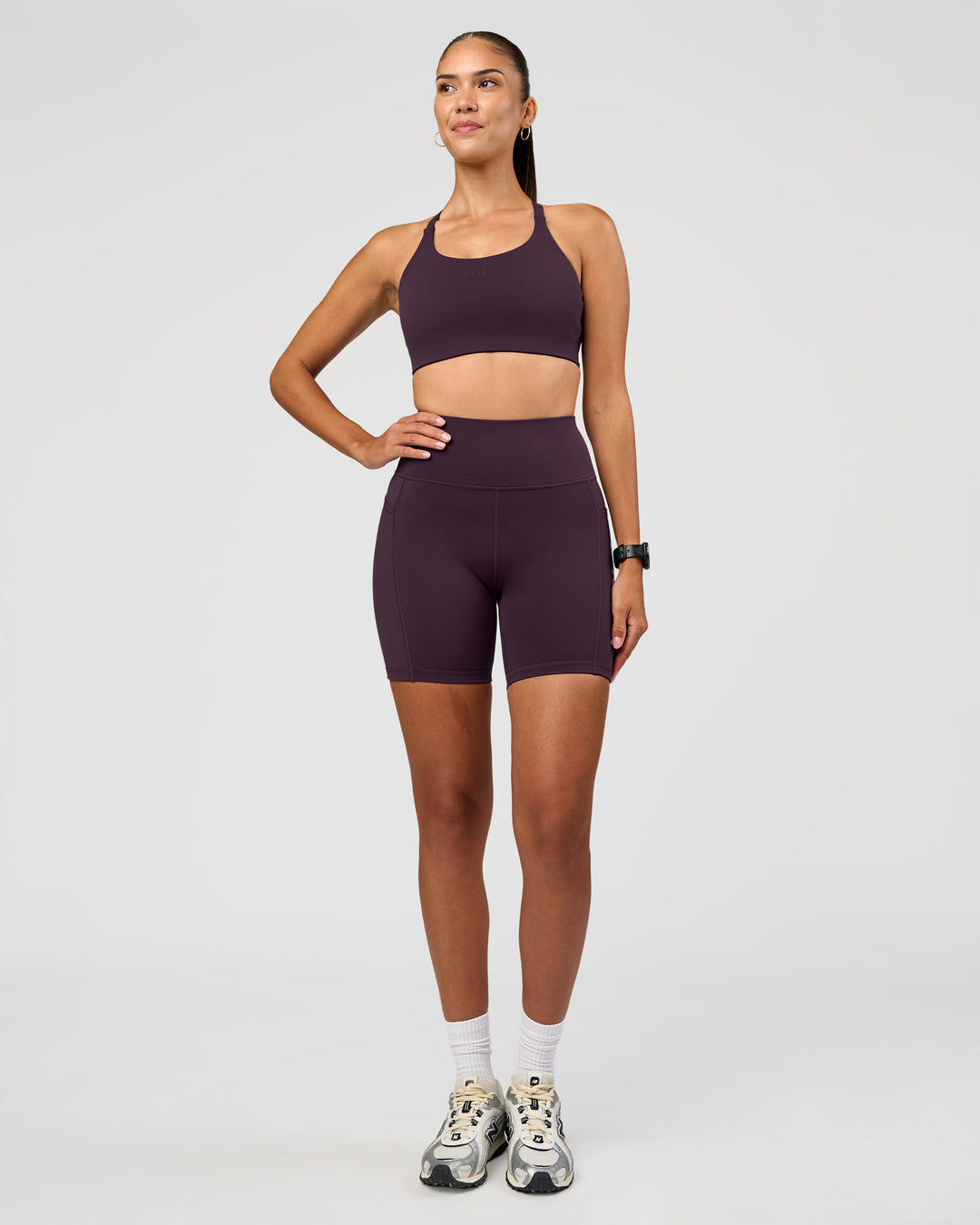 Woman wearing Rep Ultra High-Rise 6" Short Pockets - Midnight Plum-Marshmallow | Model:Rhiley | Size:S - view 4